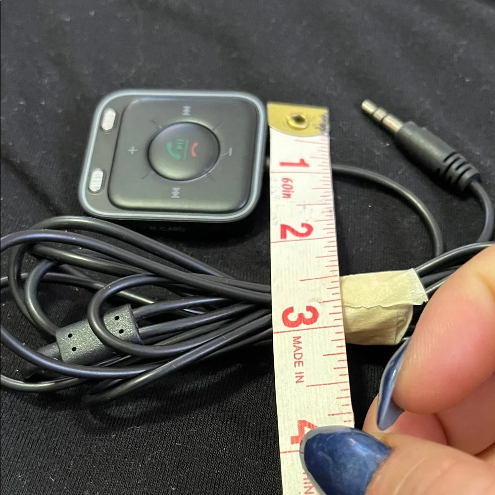 Sleek Black Wearable Charger with Control Buttons